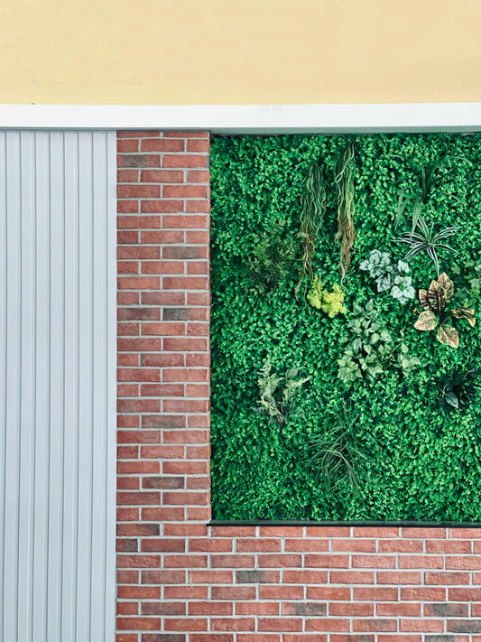 Green wall with brick and white paneling panels